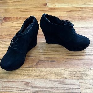 Heeled lace up booties